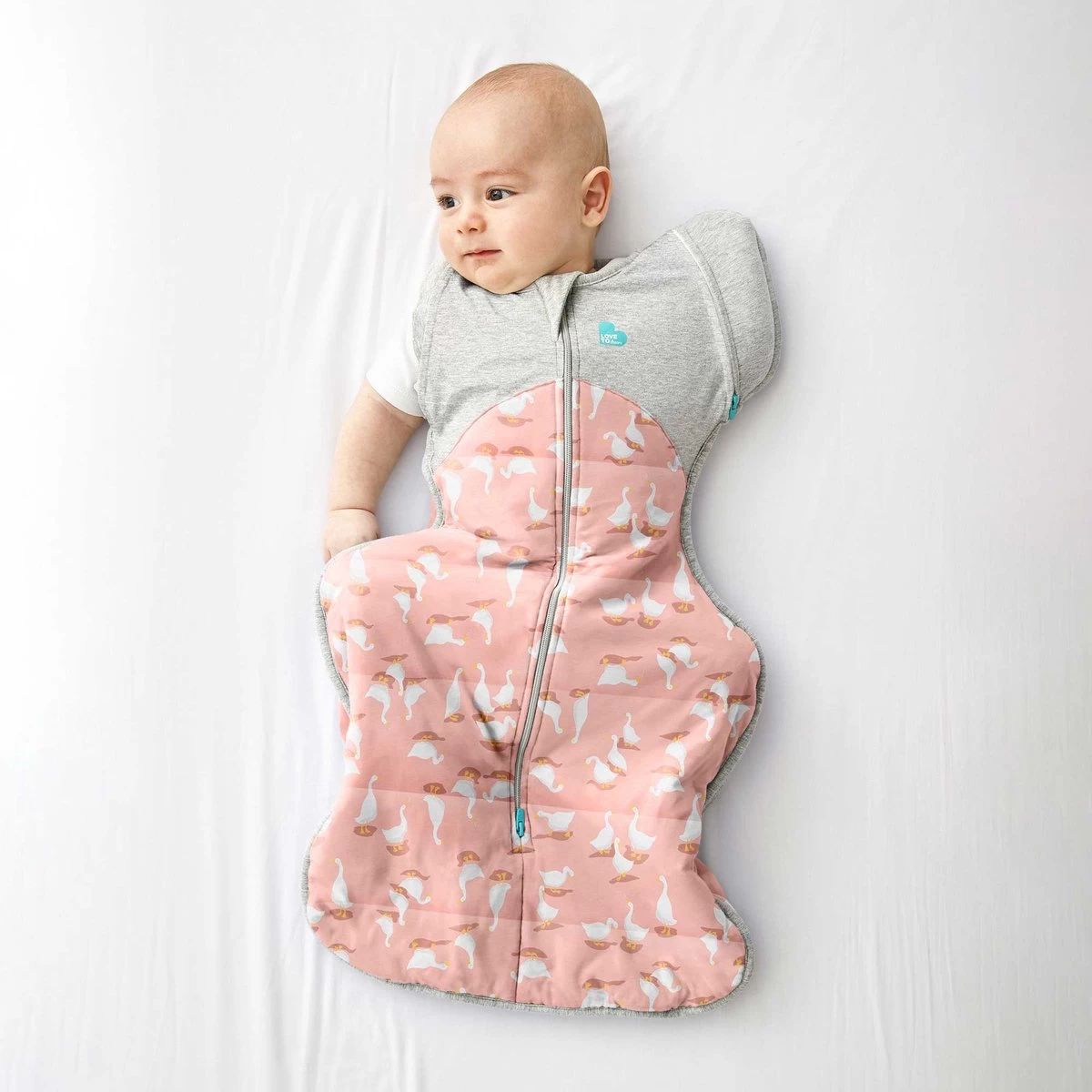 Love To Dream™ Swaddle Up™ Overgangsslaapzak – Medium 6 - 8,5 Kg – 2.5 TOG (16°C- 20°C) – Pink – Fase 2 Uitbakeren 3 Love To Dream™ Swaddle Up™ Overgangsslaapzak – Medium 6 - 8,5 Kg – 2.5 TOG (16°C- 20°C) – Pink – Fase 2 Uitbakeren - Afbeelding 3